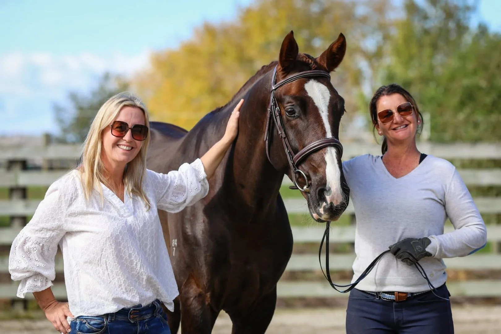 Simone Kann and a client with a chestnut sport horse at Balmoral Stables